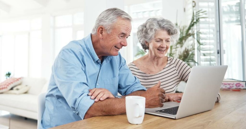 Elderly Couple on Laptop Screen Share Call