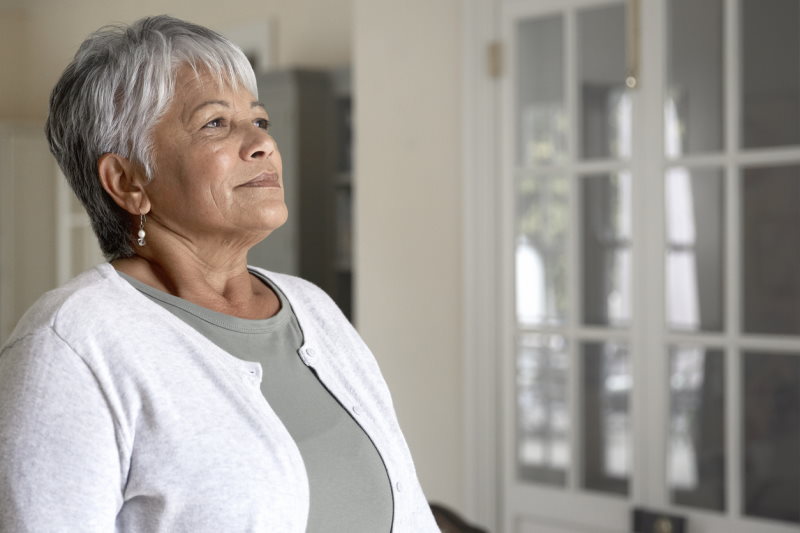 Senior Woman Looking Outside